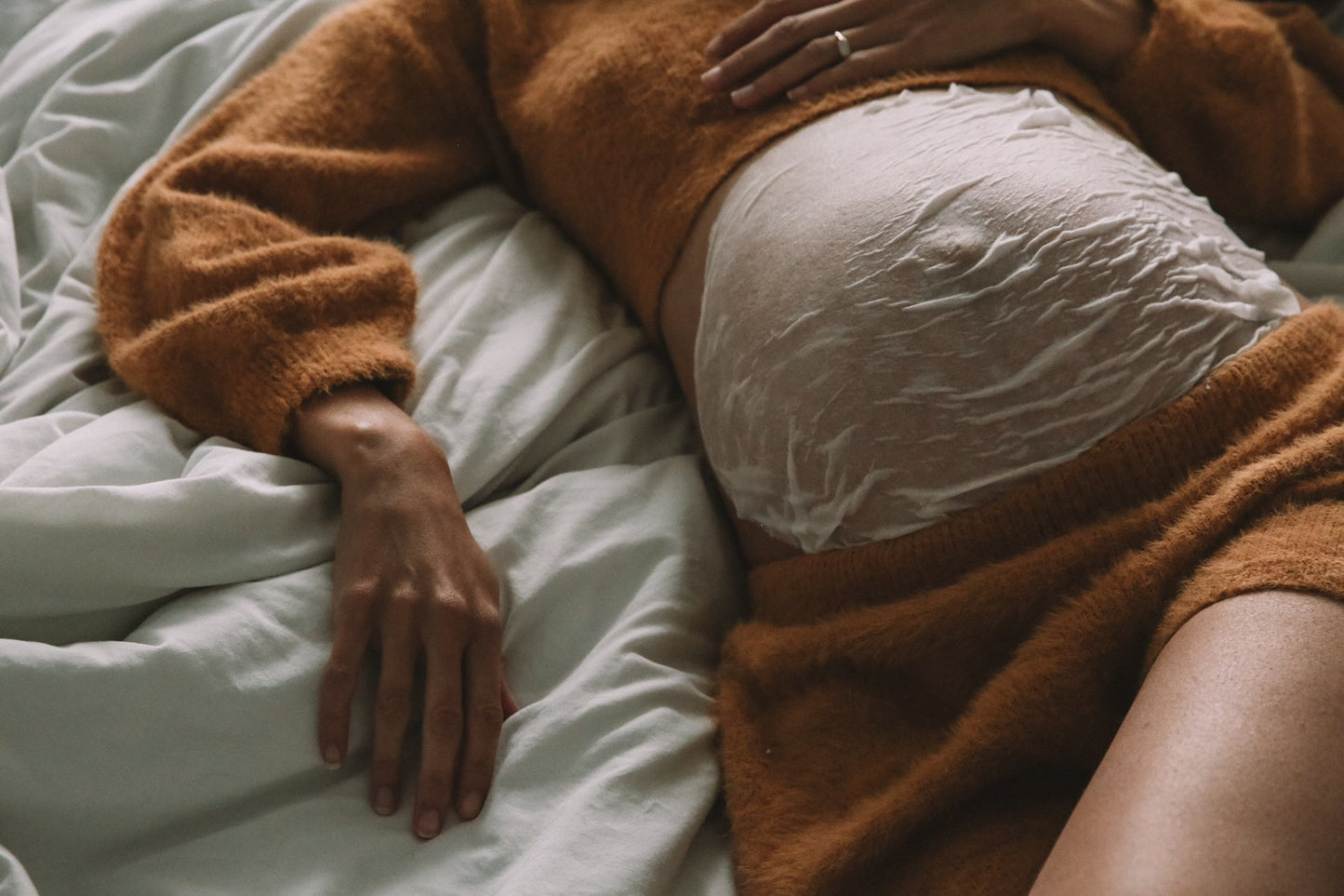 Blissful Moments from SoKind. Sheet mask applied on belly