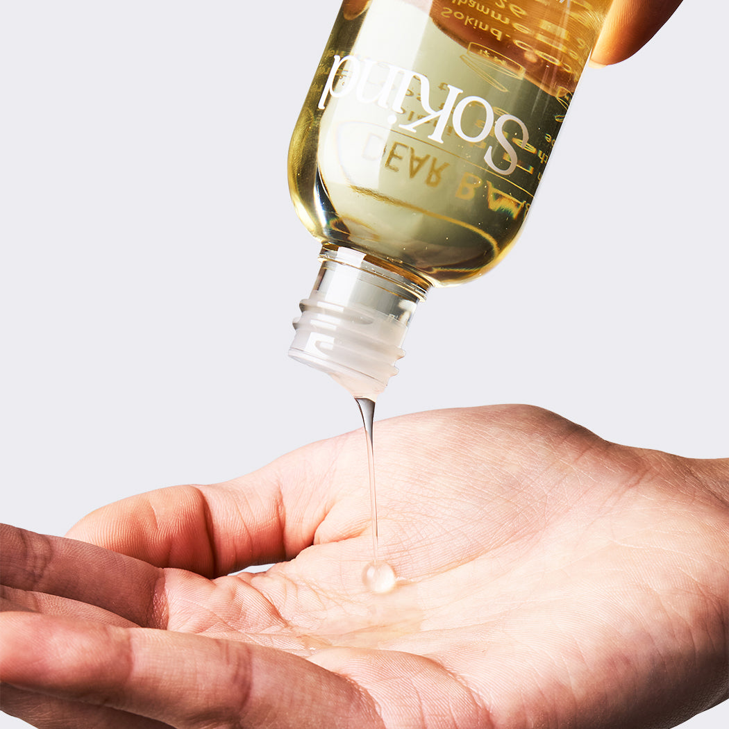 Velvet Droplets from SoKind, a nurturing baby bath oil, formula applied in hand