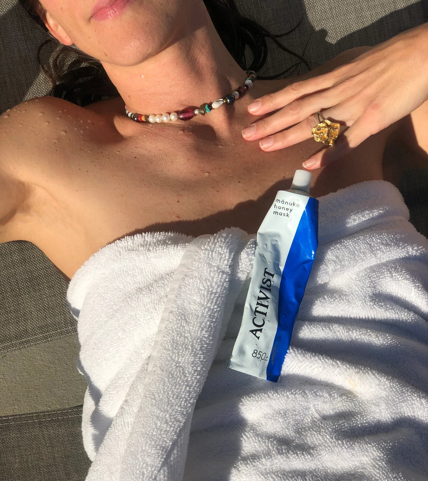 Mānuka Honey Mask from ACTIVIST tube on women body