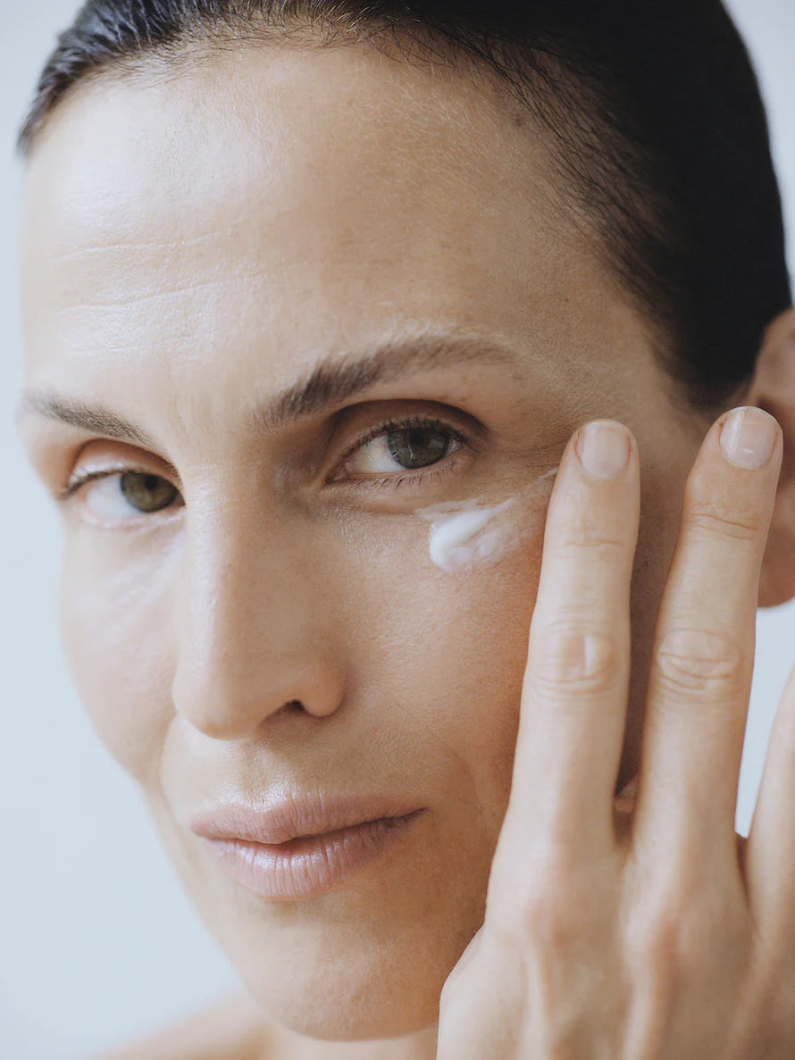 Awakening Eye Cream from LESSE, applying on woman face