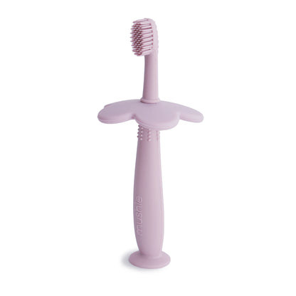 Flower training toothbrush from Mushie in color soft lilac