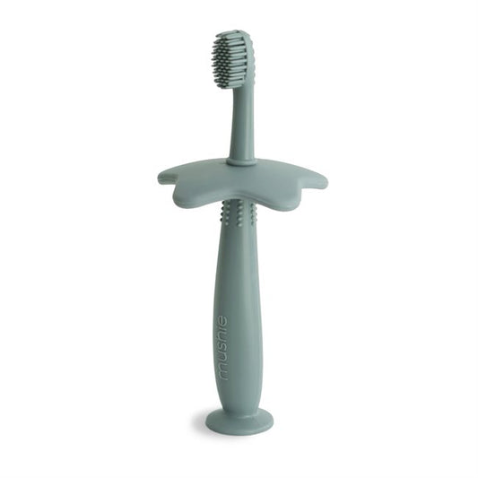 Star training toothbrush from mushie in Cambridge blue color