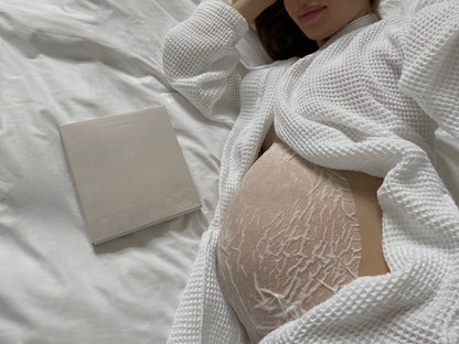 Blissful Moment from SoKind, a belly sheet mask applied on pregnant belly