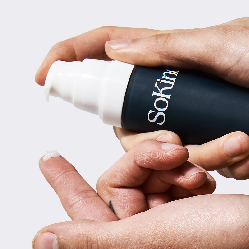 Pure Kindness from SoKind, a nipple balm, applying formula on finger